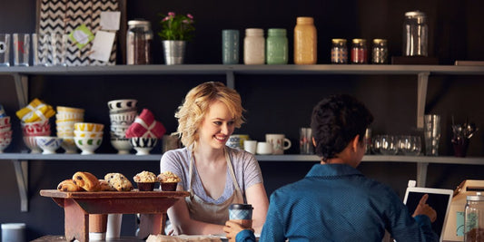 coffee shop owner and customer