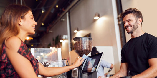 paying for coffee barista