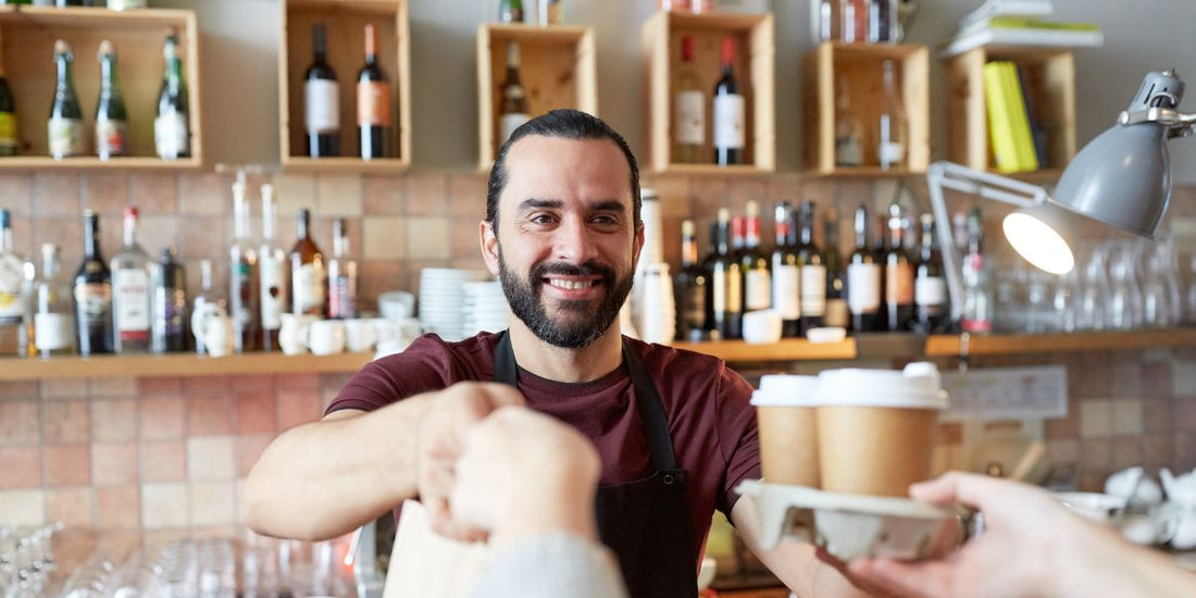 barista serving coffee
