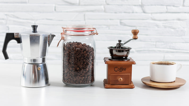 moka pot and coffee grinder