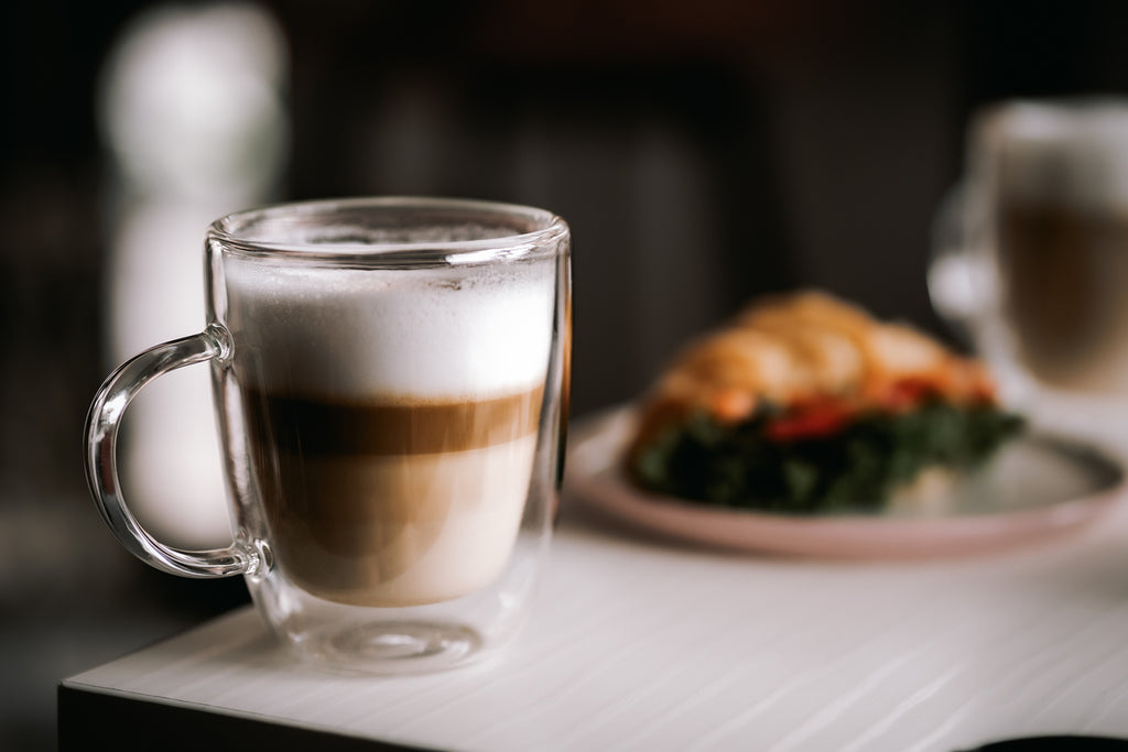 A glass of latte coffee