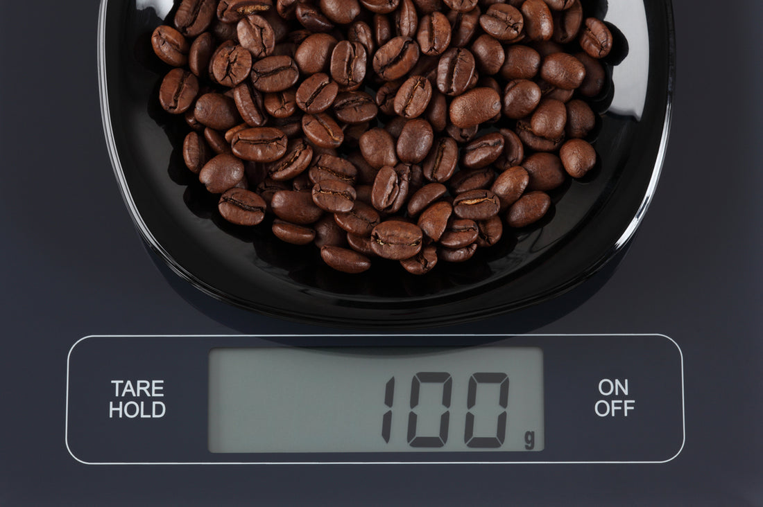 coffee beans on a weighing scale